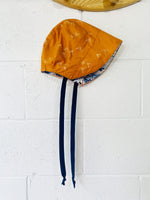Blue Cacti + Orange Shapes Reversible Brimmed Bonnet, 18-24 months